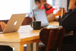 Businessmen Cafe Notebooks Social Blog Mobile