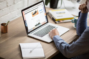 Man working on Macbook laptop